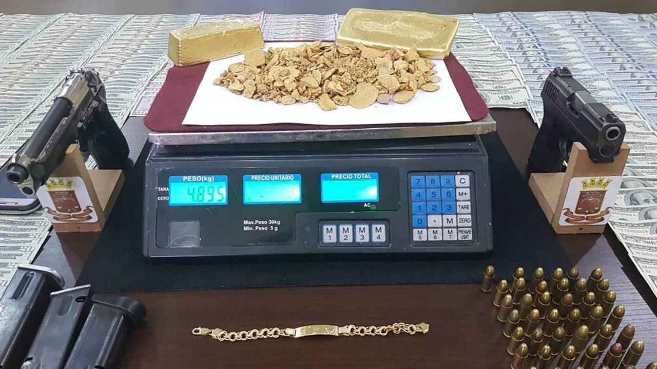 Confiscated weapons and gold from alleged gangs in Bolivar state, near El Callao. Provided to CNN by a senior Venezuelan military source.