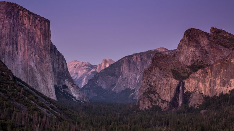 <strong>Yosemite National Park, California</strong>: A little after sunset, Yosemite Valley is bathed in pink light on an August evening. 