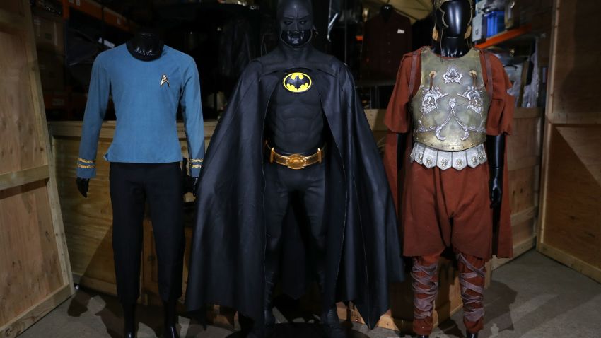 (left to right) Spock's screen matched science officer costume worn by Leonard Nimoy in Star Trek: The Ultimate Computer & The Omega Glory (TV series 1966-1969) (estimate ??50-70,000), Michael Keaton's Batsuit from the 1989 film Batman (estimate ??80-120,000) and Maximus screen matched Roman general armour worn by Russell Crowe in the 2000 film Gladiator (estimate ??30-50,000), during a preview of the forthcoming film and television memorabilia auction at the Prop Store head office near Rickmansworth. (Photo by Andrew Matthews/PA Images via Getty Images)