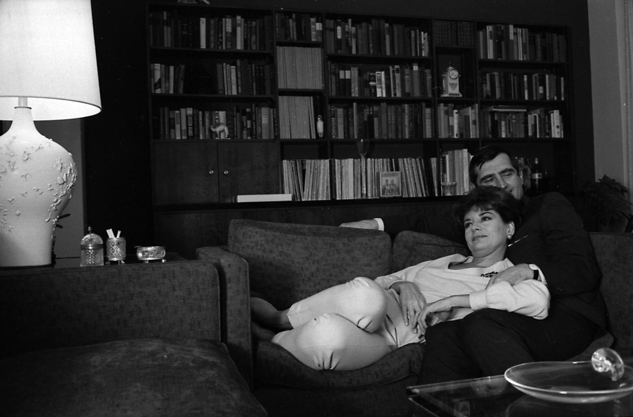 Walters relaxes with her second husband, businessman and theater producer Lee Guber, at their New York home in 1966.