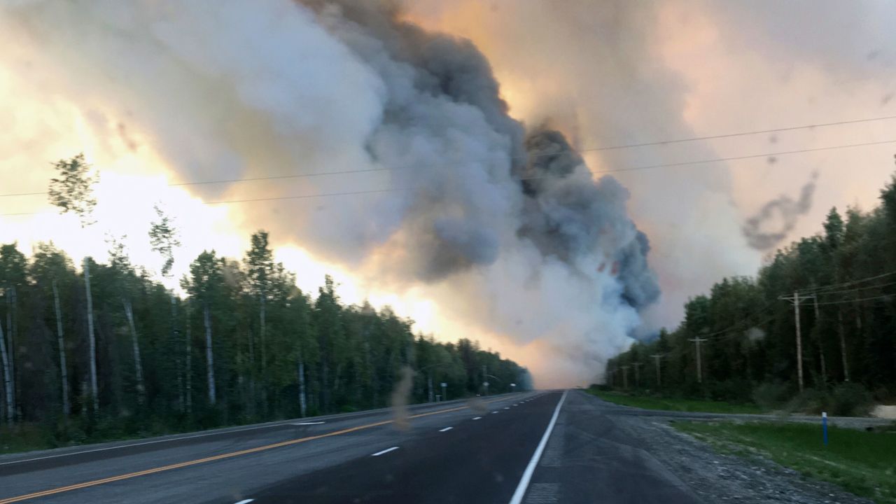 Smoke plumes from the McKinley Fire along the Parks Highway in Alaska.