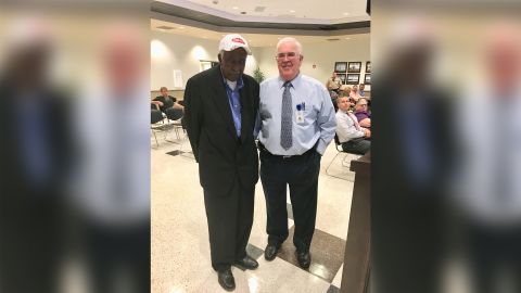 David Wright, left, stands with Jerry Partlow, transportation director for Wilson County Schools during the ceremony honoring the renaming of the school district's transportation department in Wright's honor.