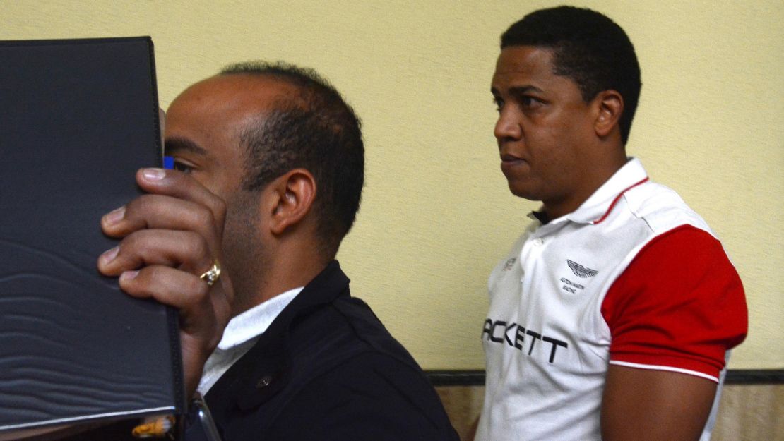 Former pitcher Octavio Dotel is transferred to a police station after his Monday arrest.