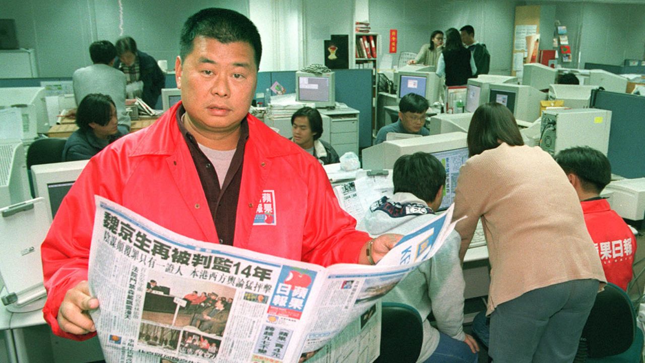 Jimmy Lai with his Chinese-language Apple Daily newspaper which sparked a price war when it launched in 1995.