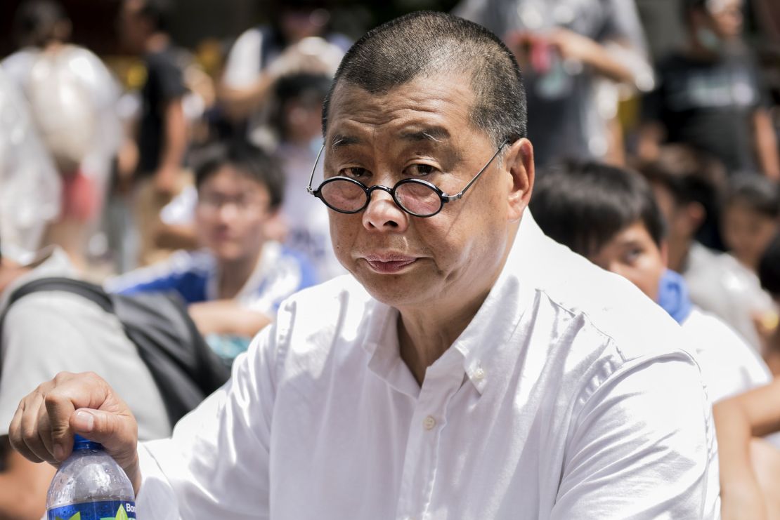 Hong Kong media tycoon and pro-democracy supporter Jimmy Lai attends a rally near the government headquarters in Hong Kong on September 28, 2014. 