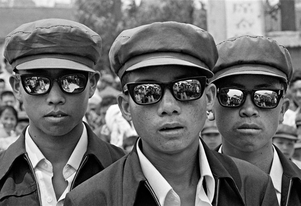 Three young men pictured in Jinhong County, Yunnan province in 1980.