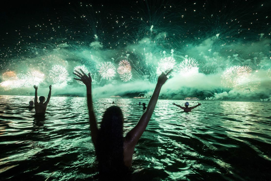 The New Year's Eve celebration at Rio de Janeiro's Copacabana Beach includes fireworks and often a late-night swim.