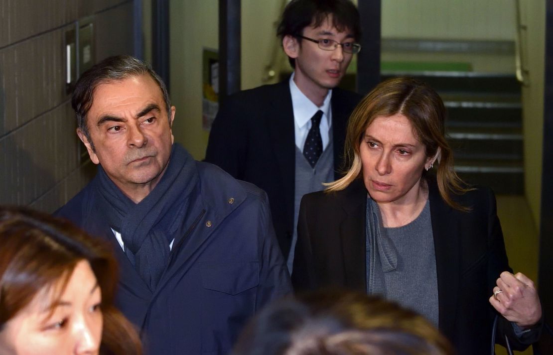 Carlos Ghosn and Carole Ghosn leaving his lawyer's office in Tokyo in April.