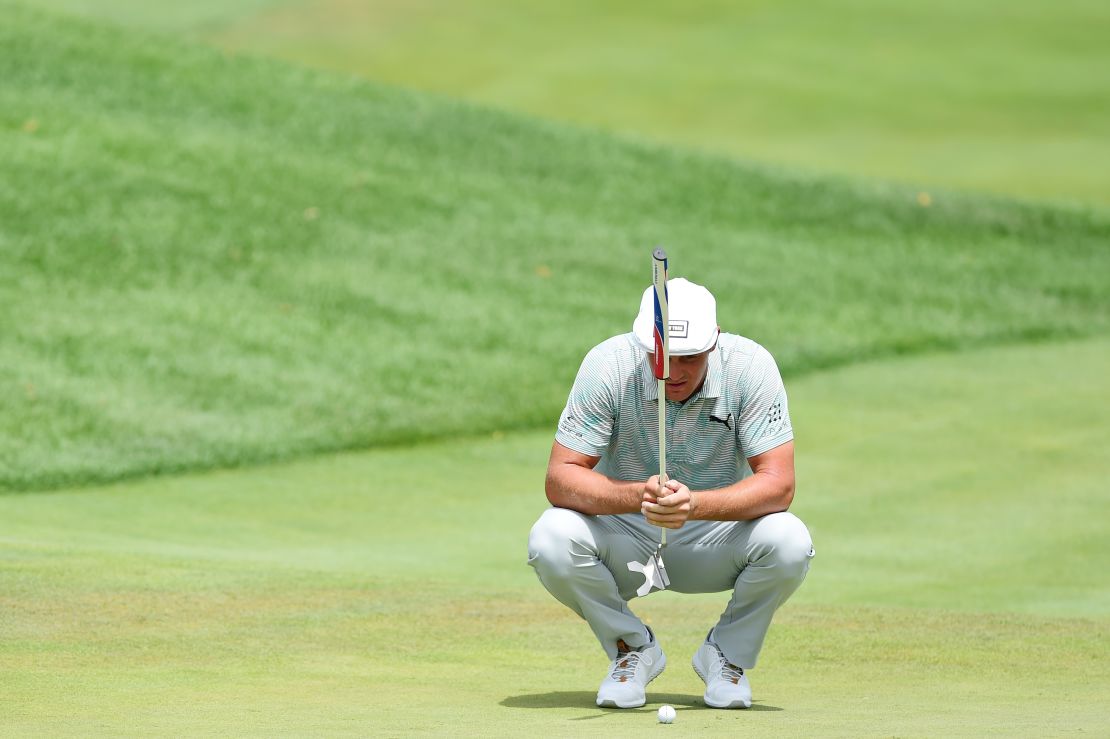 Bryson DeChambeau lines up a putt at The Northern Trust.
