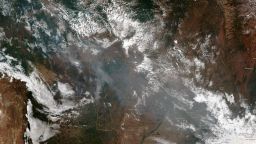 A satellite image of smoke from several fires in the Amazon rainforest burning in two Amazonian states on Wednesday. 