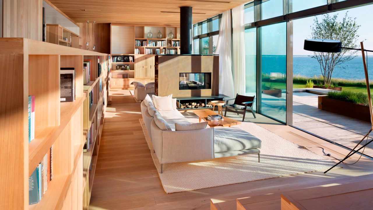 A 100-foot wall of glass allows for undisturbed views of the water in this home designed by Caleb Mulvena.
