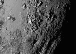 IN SPACE - JULY 14:  In this handout provided by the National Aeronautics and Space Administration (NASA), a close-up image of a region near  Pluto's equator shows a range of mountains rising as high as 11,000 feet (3,500 meters) taken by NASA's New Horizons spacecraft as it passed within 7,800 feet of the dwarf planet on July 14, 2015. The 1,050-pound piano sized probe, which was launched January 19, 2006 aboard an Atlas V rocket from Cape Canaveral, Florida, zipped by the planet yesterday.  (Photo by NASA/APL/SwRI via Getty Images)