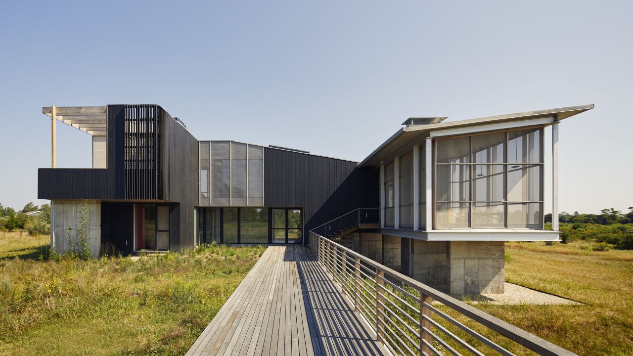 The Cohen's home was  designed to float above the wetlands meadow in Long Island's North Fork.