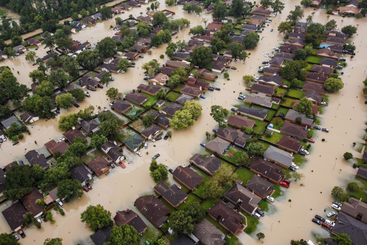 This aerial photo shows flooded residential neighborhoods in Houston.