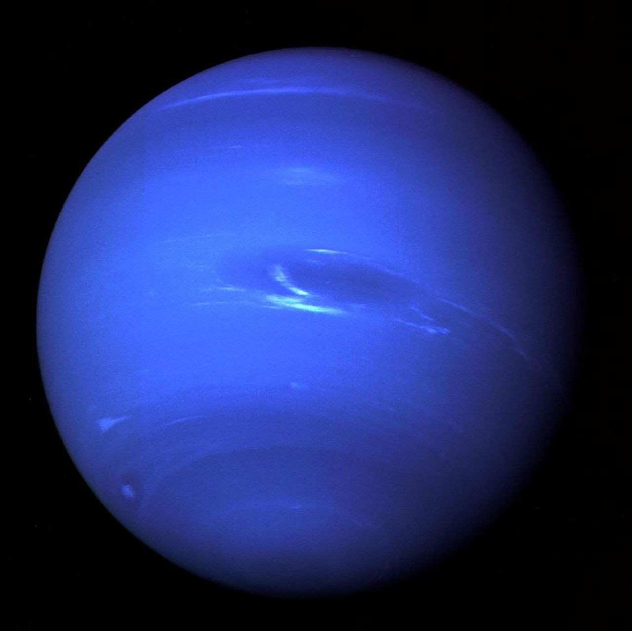 This stunning portrait of Neptune was taken by Voyager 2 before closest approach on August 25, 1989. The "Great Dark Spot" - a storm in Neptune's atmosphere - can be seen in the middle of the image.