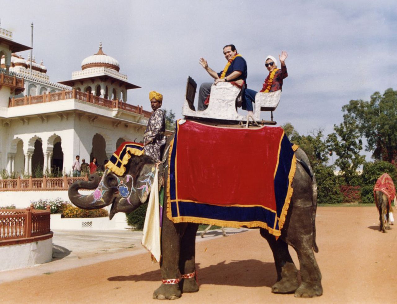 Scalia and Ginsburg pose on an elephant during their tour of India in 1994. Scalia once said they were an "odd couple" and he counted her as his "best buddy" on the bench.