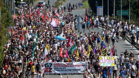 Protesters march in Hendaye as world leaders converge on the southern French resort town of Biarritz for the G7 summit. 