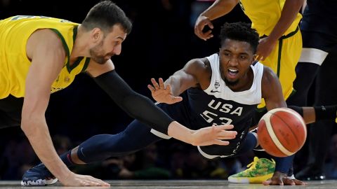 Australia's Andrew Bogut, left, and United States' Donovan Mitchell, right, during Saturday's game.
