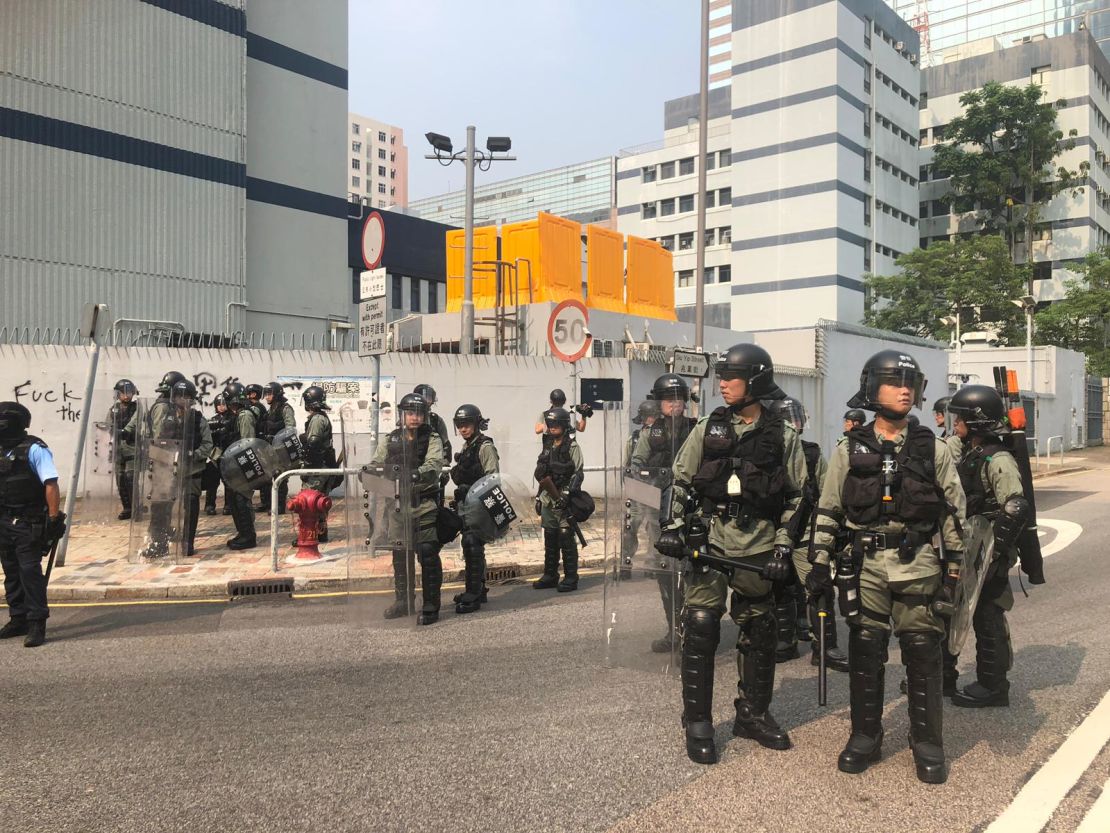 Riot police gather near a protest in Kwun Tong, Hong Kong, on August 24, 2019.