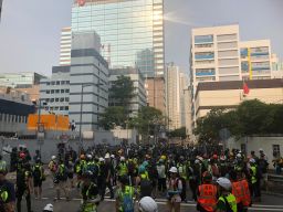 Media, protesters and police at a demonstration in Kwun Tong, Hong Kong, on August 24, 2019.