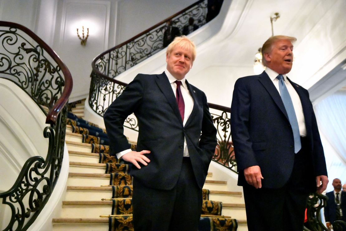 US President Donald Trump and Britain's Prime Minister Boris Johnson arrive for a breakfast meeting during the G7 on Sunday.