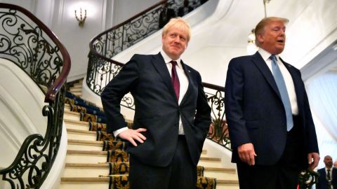 US President Donald Trump and Britain's Prime Minister Boris Johnson arrive for a breakfast meeting during the G7 on Sunday.