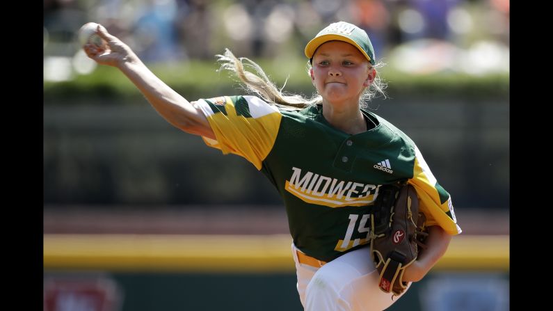 Minnesota's <a href="index.php?page=&url=https%3A%2F%2Fwww.cnn.com%2F2019%2F08%2F19%2Fus%2Fmaddy-freking-little-league-world-series-trnd%2Findex.html" target="_blank">Maddy Freking</a> delivers a pitch during the third inning of a Little League World Series game against Virginia in South Williamsport, Pennsylvania, on Sunday, August 18. Freking is only the 19th girl to play in the series and the sixth to ever pitch.