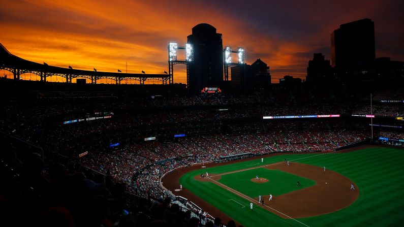 The sun sets over Busch Stadium in the fourth inning of a baseball game between the St. Louis Cardinals and the Milwaukee Brewers in St. Louis, Missouri, on August 20.