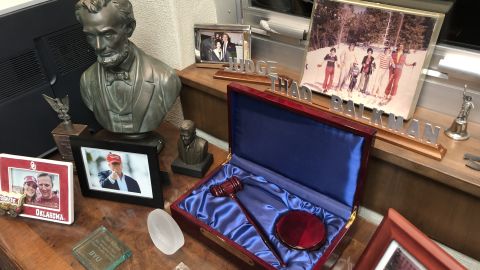 Thad Balkman's office is cluttered with artifacts and photographs. The bust of Abraham Lincoln with a photograph beneath it of President Donald Trump provide an interesting juxtaposition of presidential styles.