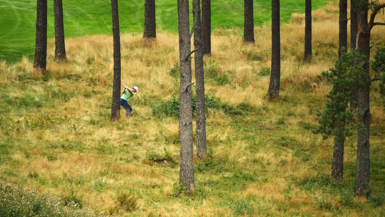 Andrea Pavan of Italy plays from the trees on the 14th hole during the first round of the Scandinavian Invitation at The Hills Golf and Sports Club in Molndal, Sweden, on August 22.