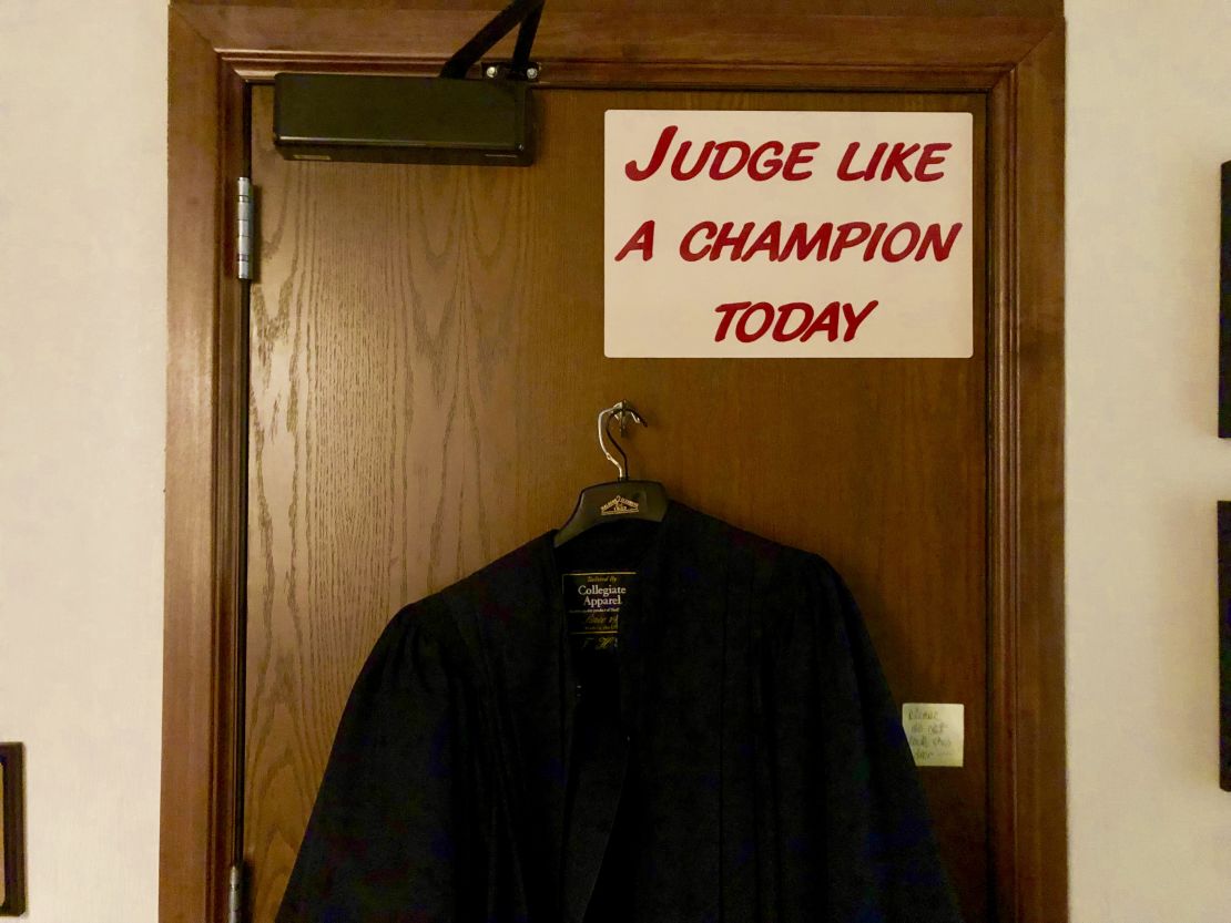 The nearby University of Oklahoma football team has a sign like this in their locker room. Balkman touches it every time he enters court.