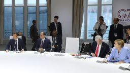The empty chair of US Presisdent Donald Trump is seen as (from L) French President Emmanuel Macron, Egyptian President Abdel Fattah al-Sissi, Chile president Sebastian Piniera and German chancellor Angela Merkel attend a work session focused on climate in Biarritz, south-west France on August 26, 2019, on the third and last day of the annual G7 Summit attended by the leaders of the world's seven richest democracies, Britain, Canada, France, Germany, Italy, Japan and the United States. (LUDOVIC MARIN/AFP/Getty Images)