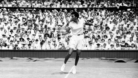In this 1957 photo, Althea Gibson makes a return to Darlene Hard during their WImbledon Championship match. Gibson won 6-3, 6-2.
