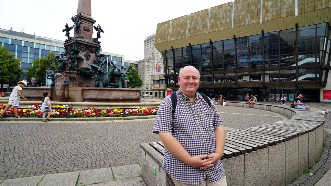 Saxony AfD candidate, Jörg Kühne, sits in the square where 30 years ago he joined freedom demonstrations.