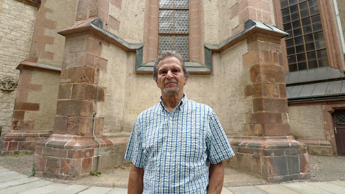 Retired pastor Christophe Wonneberger outside St. Nicholas Church, where the weekly demonstrations began.