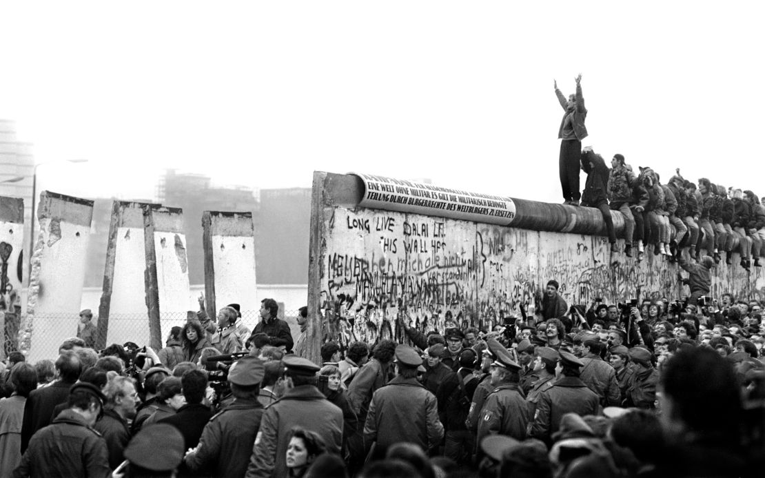 The Berlin Wall comes tumbling down in November 1989.