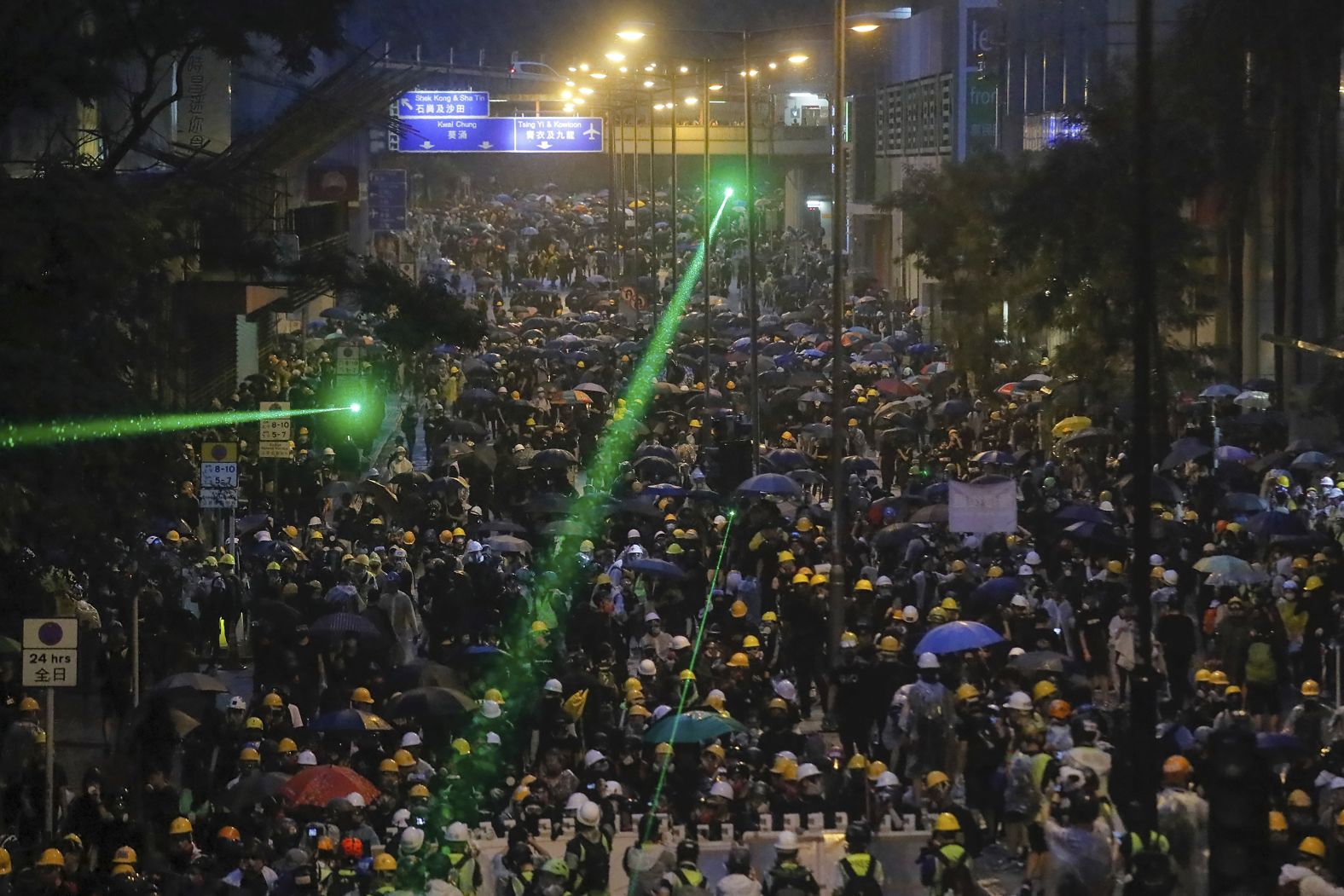 Some protesters shine laser pointers at police lines on August 25.