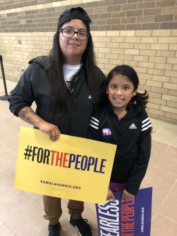 Anna Maddox and her little sister Leah Chau traveled two hours to get to a Harris rally in 2019.
