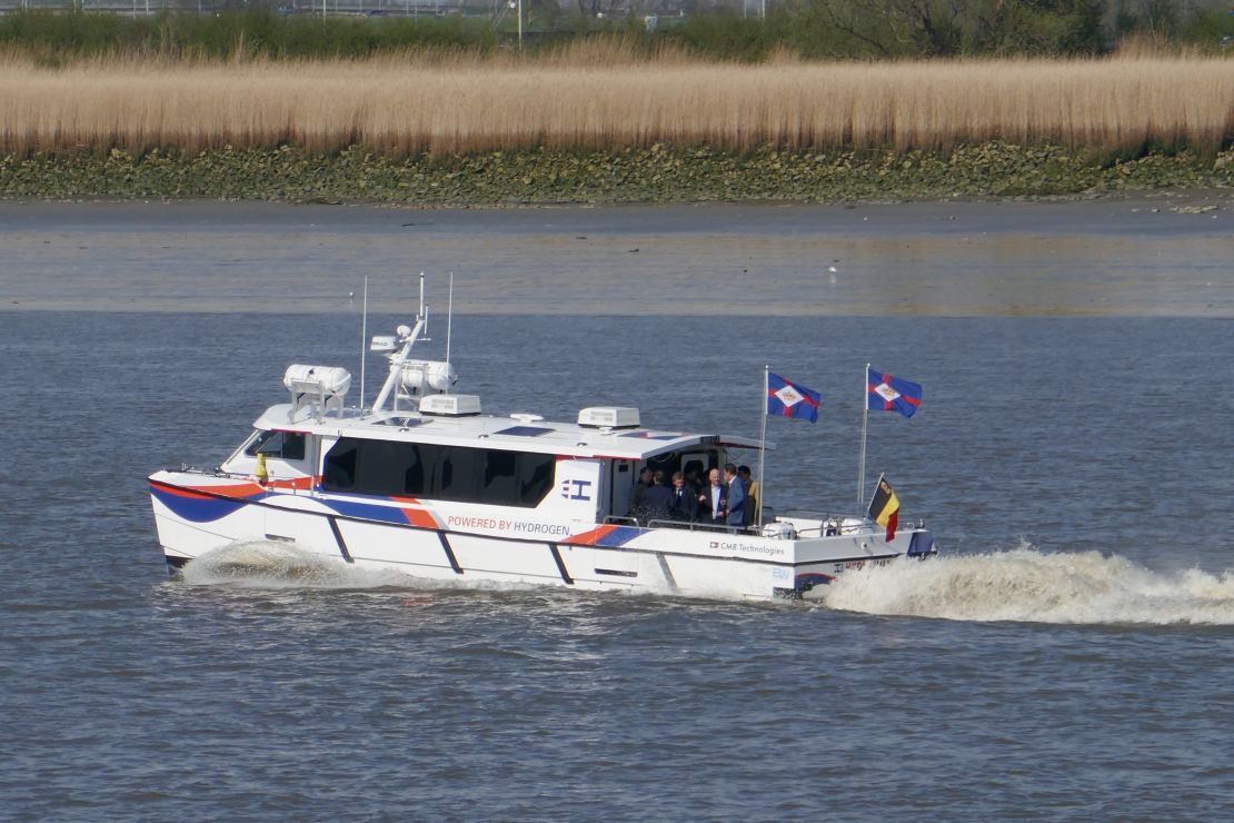 The Hydroville sailing on the Scheldt river in Belgium, with employees of Compagnie Belge Maritime on board.
