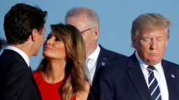 First Lady Melania Trump kisses Canada's Prime Minister Justin Trudeau next to the U.S. President Donald Trump during the family photo with invited guests at the G7 summit in Biarritz, France, August 25, 2019. REUTERS/Carlos Barria     TPX IMAGES OF THE DAY