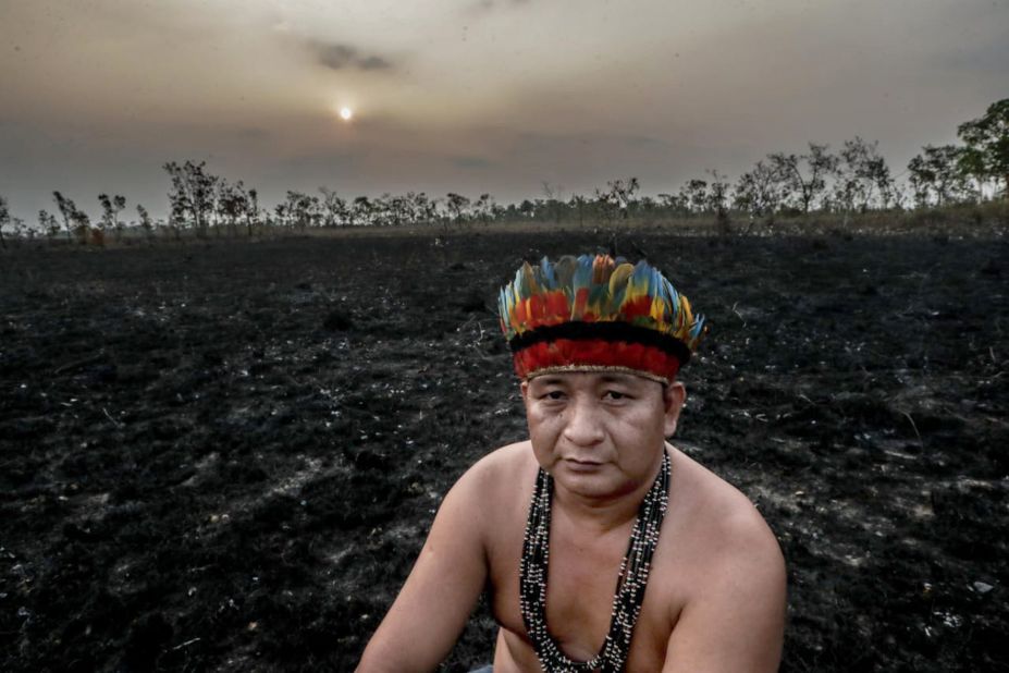 Indigenous leader Antonio Enésio Tenharin is photographed in a burned area of Brazil's Manicoré region.