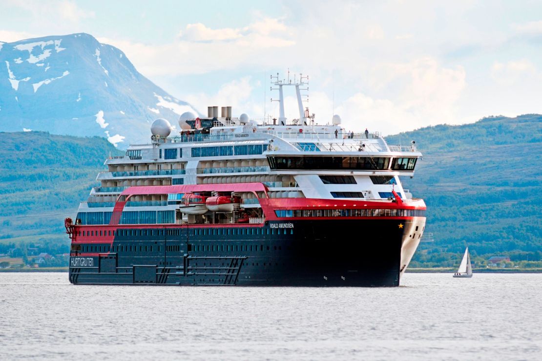 The MS Roald Amundsen, the first hybrid cruise ship in Hurtigruten's fleet, arrives in Tromso, northern Norway on July 3, 2019.