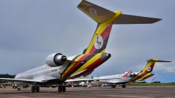 Newly acquired Uganda Airlines Bombardier CRJ900 aircraft stand on the runway at Entebbe Airport 