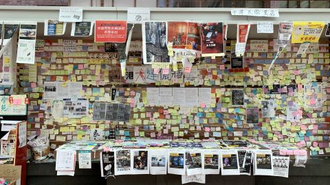 A "Lennon wall" at Hong Kong University shows protest messages, art, and posters.