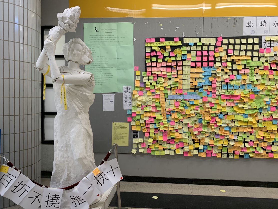 A statue of the Goddess of Democracy at Hong Kong's City University was pushed over and broken in July 2019 as the protests raged on. The statue has been pieced back together.