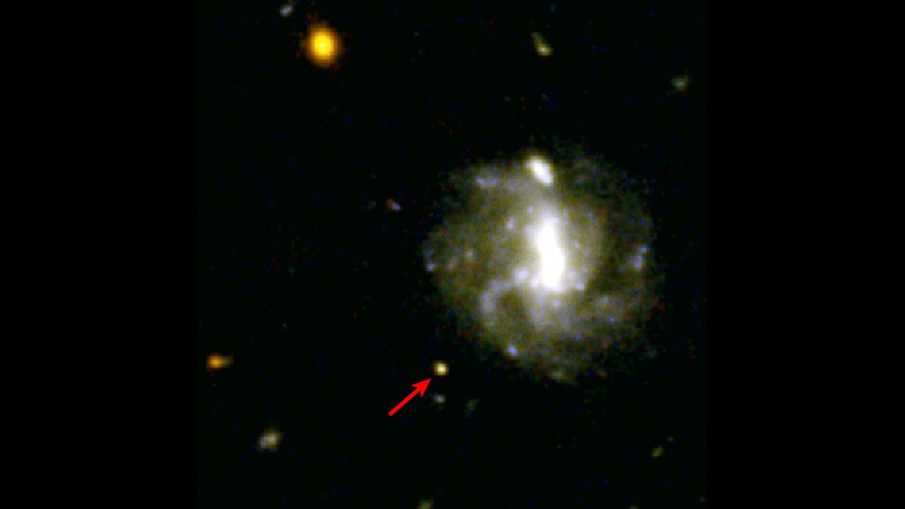 A kilanova was captured by the Hubble Space Telescope in 2016, seen here next to the red arrow. Kilanovae are massive explosions that create heavy elements like gold and platinum. 