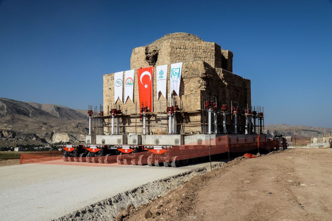 The Artuklu Hamam, a centuries-old bath house weighing 1,600 tonnes, is loaded onto a wheeled platform and moved down a specially constructed road in 2018 as part of preparations.