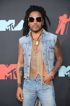 Lenny Kravitz rocked a revealing double denim ensemble with accessories by "Project Runway" alumna Natalia Fedner.