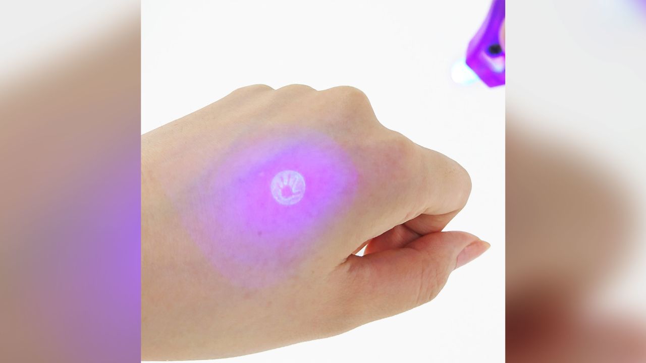 The stamp marks an assailant with a palm shape in invisible ink.