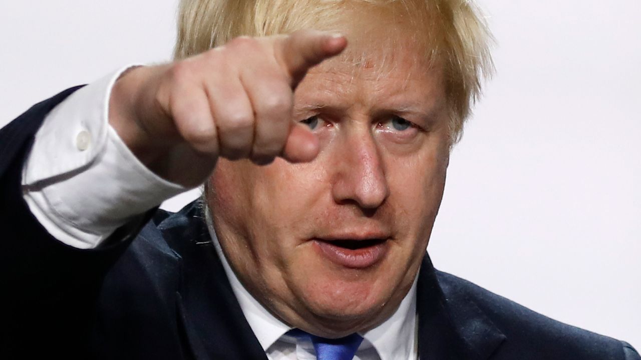 Britain's Prime Minister Boris Johnson gestures during his final press conference at the G7 summit Monday, Aug. 26, 2019 in Biarritz, southwestern France. (AP Photo/Francois Mori)